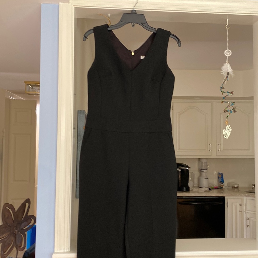 Stunning Trina Turk black jumpsuit.     Worn once.   Excellent condition.